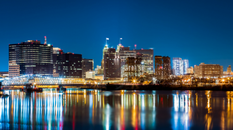Newark downtown skyline at night with colorful reflections